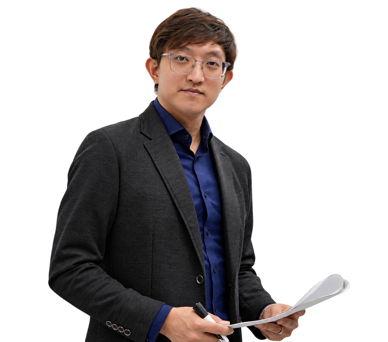 Dr. Jiwon Seo holding lesson papers and a marker.